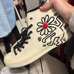 Converse Cream High-Top Sneakers with Black Graphic and Red Accent